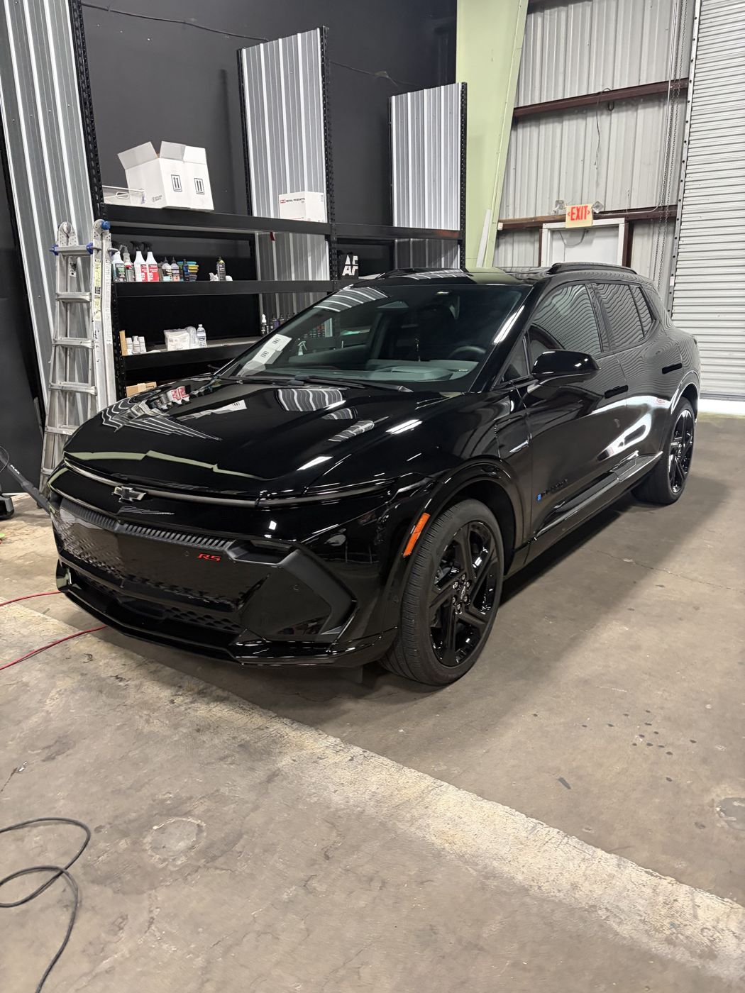 Black Chevy Equinox EV RS with deep gloss after ceramic coating